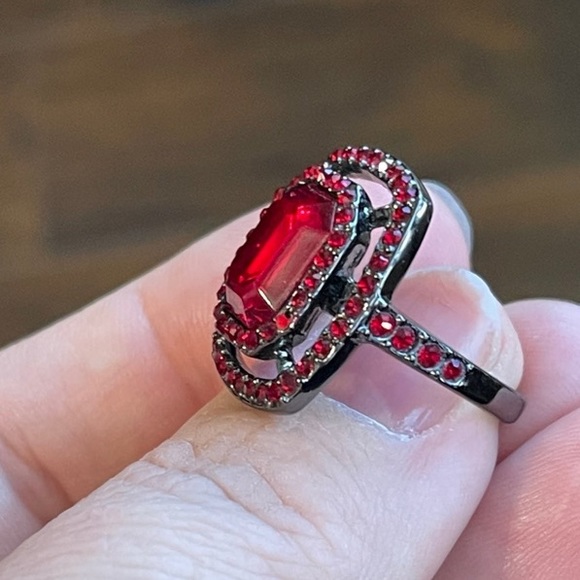 Givenchy Red Crystal
Ring in gunmetal setting. Size 6.75 - Picture 7 of 11